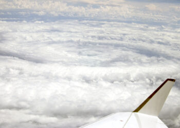 An image of Tropical Storm Edouard image taken by scientists aboard a NOAA Hurricane Hunters aircraft (Hurricane Hunters, Public domain, via Wikimedia Commons)