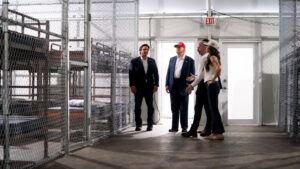 President Donald Trump is joined by Department of Homeland Security Secretary Kristi Noem, Florida Gov.Ron DeSantis, Acting Director of Immigration and Customs Enforcement Todd M. Lyons and Executive Director of Florida Division of Emergency Management Kevin Guthrie for a facility tour of “Alligator Alcatraz” at the site of the Dade-Collier Training and Transition Airport in Ochopee on July 1. (DHSgov, Public domain, via Wikimedia Commons)