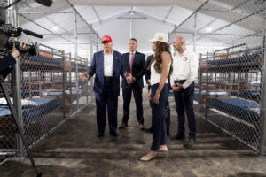President Donald Trump is joined by Department of Homeland Security Secretary Kristi Noem, Florida Gov.Ron DeSantis, Acting Director of Immigration and Customs Enforcement Todd M. Lyons and Executive Director of Florida Division of Emergency Management Kevin Guthrie for a facility tour of “Alligator Alcatraz” at the site of the Dade-Collier Training and Transition Airport in Ochopee on July 1. (DHSgov, Public domain, via Wikimedia Commons)