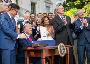 President Donald Trump signs the "One Big Beautiful Bill" into law on July 4. (White House, Public domain, via Wikimedia Commons)