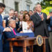 President Donald Trump signs the "One Big Beautiful Bill" into law on July 4. (White House, Public domain, via Wikimedia Commons)