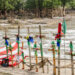 A memorial of wooden crosses on the banks of the Guadalupe River in Texas, honoring victims of the July 4 flash floods. (World Central Kitchen, CC BY 4.0, via flickr)