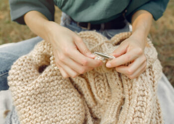 A woman knitting (iStock image)
