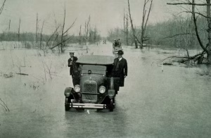 The water stretched for miles during the Great Mississippi River Flood. This highway, between the cities of Mounds and Cairo, Ill., was flooded on March 25, 1927. (Archival Photography by Steve Nicklas, NOS, NGS)