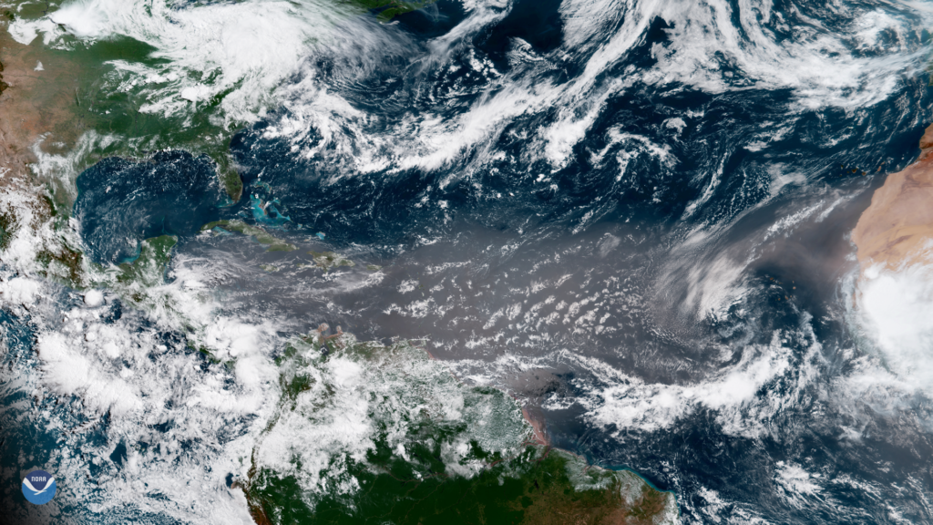 A massive plume of Saharan dust appears across the tropical North Atlantic Ocean in this image captured by the GOES East satellite in 2018. (NOAA National Environmental Satellite, Data, and Information Service)