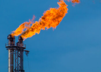 A flare burning off gas at an oil refinery (iStock image)