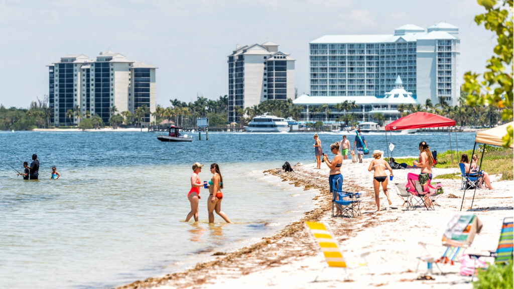 Beachgoers on Sanibel Island (iStock image)