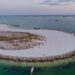 An aerial view of Norriego Point in Destin. The state purchased 4 acres for $83 million to expand a park at the beach access point. (iStock image).