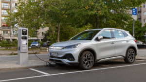 An electric vehicle made by Chinese automaker BYD charges on a street in Germany (iStock image)