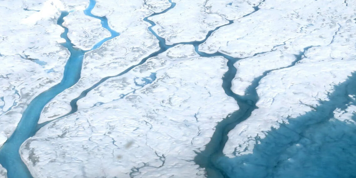 Meltwater runs across the Greenland ice sheet in rivers. The ice sheet is already losing mass and could soon reach a tipping point. (Maria-José Viñas/NASA)