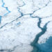 Meltwater runs across the Greenland ice sheet in rivers. The ice sheet is already losing mass and could soon reach a tipping point. (Maria-José Viñas/NASA)