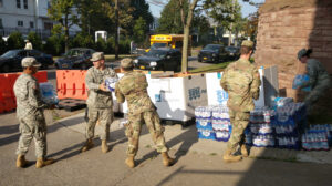 New York National Guard members collect donations for Puerto Rico and the U.S. Virgin Islands in Buffalo, N.Y., as part of recovery efforts following hurricanes Irma and Maria. (New York National Guard, Public domain, via Wikimedia Commons)
