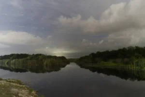 Lights from Alligator Alcatraz spill into the night in Big Cypress National Preserve in July 2025. (Photo by Anthony Sleiman)