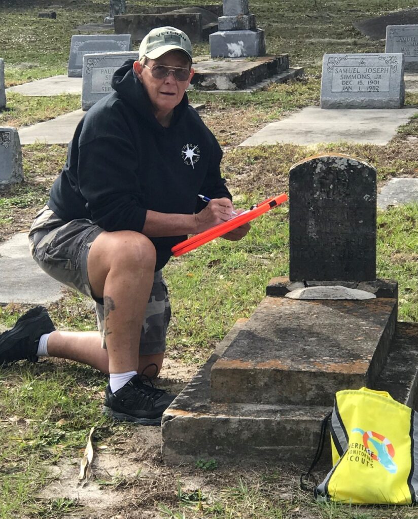 Chris Nolan filling out forms for the Heritage Monitoring Scouts program at a South Florida historic cemetery. (Photo courtesy of Chris Nolan)