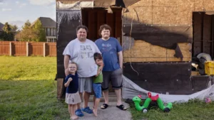 ean Bye with Chloe Bye, Cameron Bye and Dawson Blum in front of the garage of their home in Louisiana. (Kathleen Flynn/Grist)