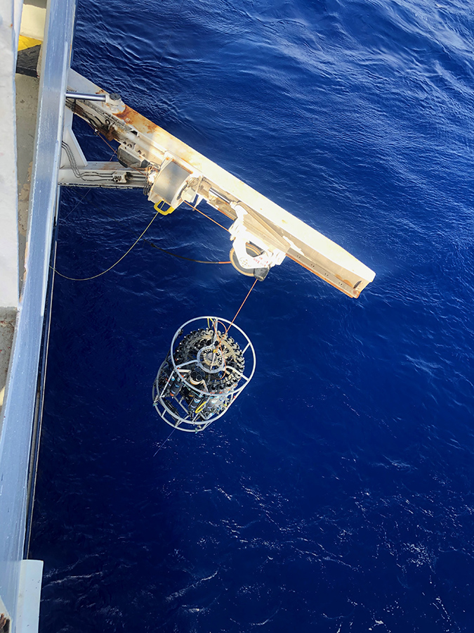 CTD-Niskin rosette devices, which measure conductivity, temperature and depth, were deployed to collect water samples in the Indian Ocean. (Photo by Heather Forrer)