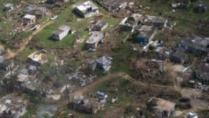 An aerial view of damage caused by Hurricane Melissa in Jamaica (Staff Sgt. Alexander Merchak/U.S. Air Force, Public domain, via Wikimedia Commons)