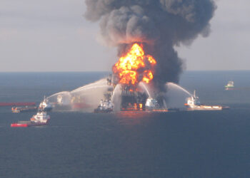 Fire boat response crews battle the blazing remnants of the offshore oil rig Deepwater Horizon on April 21, 2010. (US Coast Guard, Public domain, via Wikimedia Commons)
