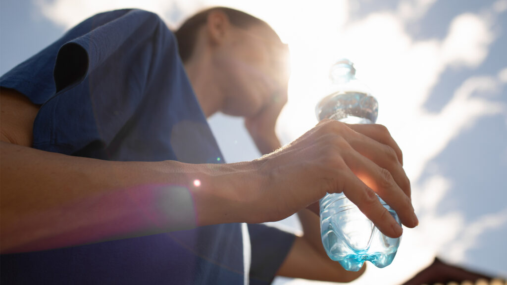 A woman copes with the heat (iStock image)