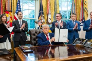President Donald Trump signs executive orders regarding nuclear energy on May 23 in the Oval Office. (Official White House Photo by Molly Riley)