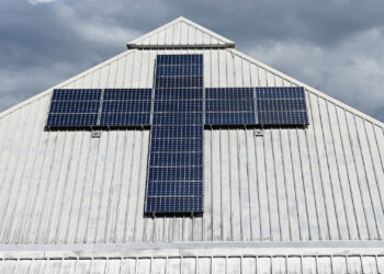 Solar panels in the shape of a cross on the roof of a church (iStock image)
