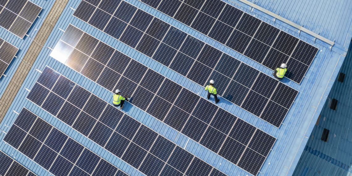 Solar panels on a factory rooftop (iStock image)