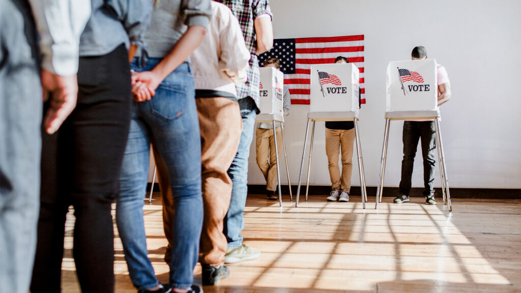 Voters wait to cast their ballots at a polling place (iStock photo)