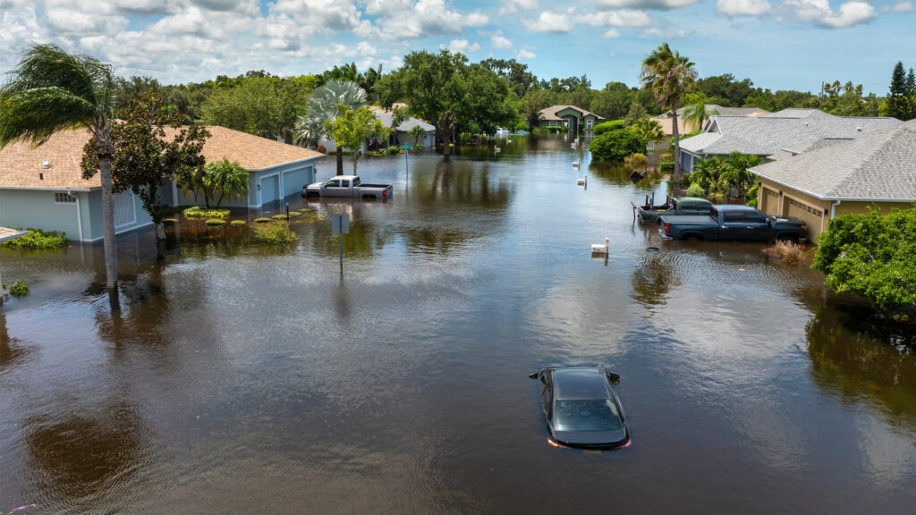 Homes and vehicles affected by flooding in Florida (iStock image)