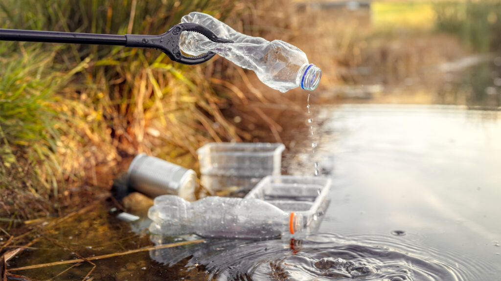 Plastic waste is removed from a waterway (iStock image)