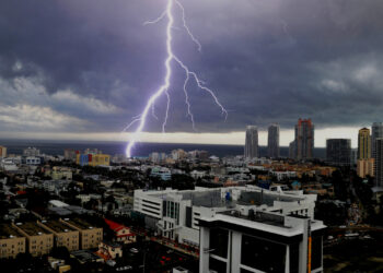 Lightning strikes the water just off South Beach. (iStock image)