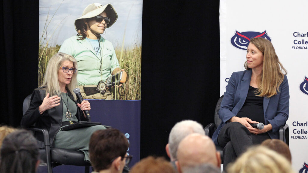 Valery Forbes (left) speaks during the panel discussion while Molly Moynihan (right) listens. (Zach Greathouse photo)