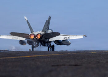 A U.S. jet prepares to launch from an aircraft carrier in support of Operation Epic Fury on Feb. 28. (U.S. Navy photo, Public domain, via Wikimedia Commons)