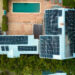 A home covered with rooftop solar panels (iStock image)