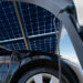 An electric vehicle charging from solar panels (iStock image)