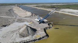 An aerial view of an excavator used to remove dirt for the Everglades Agricultural Area Reservoir Project, with construction now targeted for completion by 2029. (USACE photo by Mark Rankin via Defense Visual Information Distribution Service)