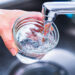 Water being poured into a glass from a faucet (iStock image)