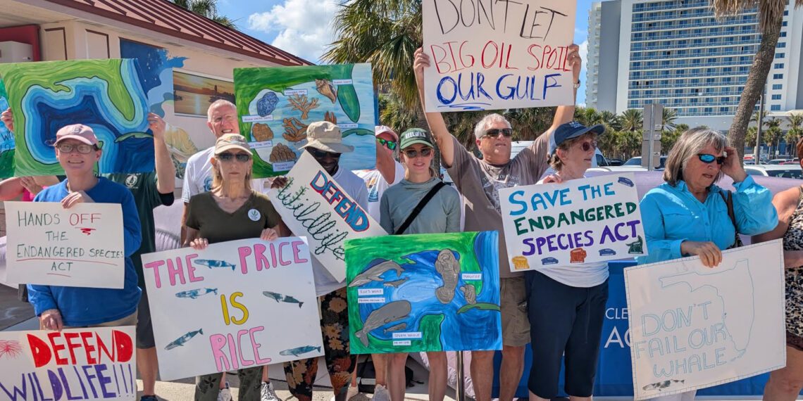 Environmental activists on Clearwater Beach on Saturday. (Photo by Mitch Perry/Florida Phoenix)