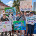Environmental activists on Clearwater Beach on Saturday. (Photo by Mitch Perry/Florida Phoenix)