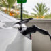 An electric vehicle charging in a parking garage in St. Petersburg. (iStock image)