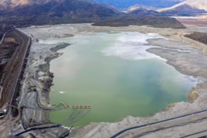 Copper-mining companies create huge tailings ponds, like this one in Chile in 2019, to store toxic byproducts of mining. Hundreds of these waste ponds exist across the country and carry the risk of leaking acidic water and heavy metals such as arsenic, copper and mercury into groundwater. (Martin Bernetti/AFP via Getty Images)
