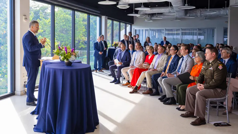 Michael Berkowitz, executive director of the Climate Resilience Institute, welcomes the royal couple to the Rosenstiel School. (Photo: Joshua Prezant/University of Miami)