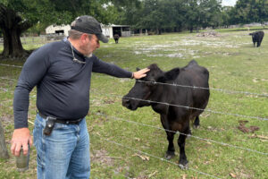 Eric Miller lives on five acres with his wife, six cows, a bull, three goats and more than 20 chickens. (Amy Green/Inside Climate News)