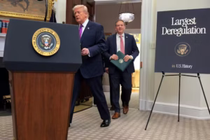 President Donald Trump and U.S. Environmental Protection Agency Administrator Lee Zeldin arrive for a White House event to announce a rollback of the 2009 Endangerment Finding on Feb. 12. (Anna Moneymaker/Getty Images)