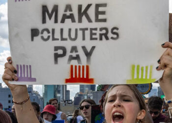 Activists cross the Brooklyn Bridge during a Youth Global Climate demonstration ahead of the UN Climate Week in New York City in 2024. (Alex Kent/AFP via Getty Images)