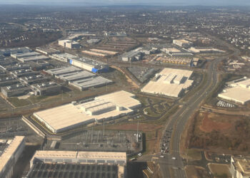 An aerial view of data centers intermingled with other commercial buildings in Loudoun County, Virginia (Theodore Christopher, CC0, via Wikimedia Commons)