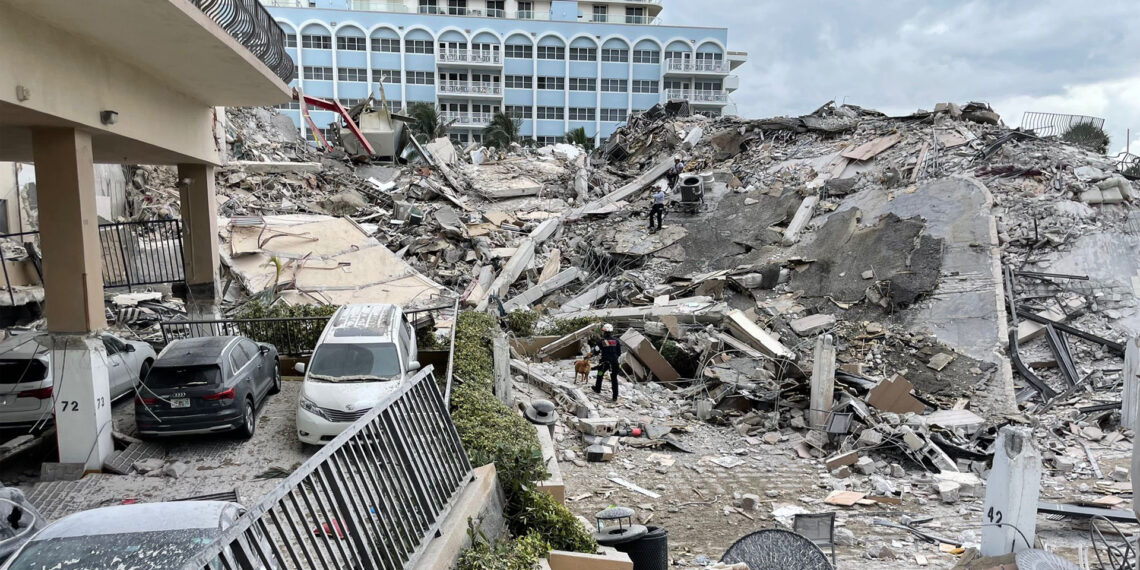 A ground view of the partially collapsed Champlain Towers South condo building in 2021 (Miami-Dade Fire Rescue Department, Public domain, via Wikimedia Commons)