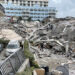 A ground view of the partially collapsed Champlain Towers South condo building in 2021 (Miami-Dade Fire Rescue Department, Public domain, via Wikimedia Commons)