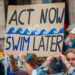 Demonstrators at a rally calling for climate action (Ivan Radic, CC BY 2.0, via Wikimedia Commons)